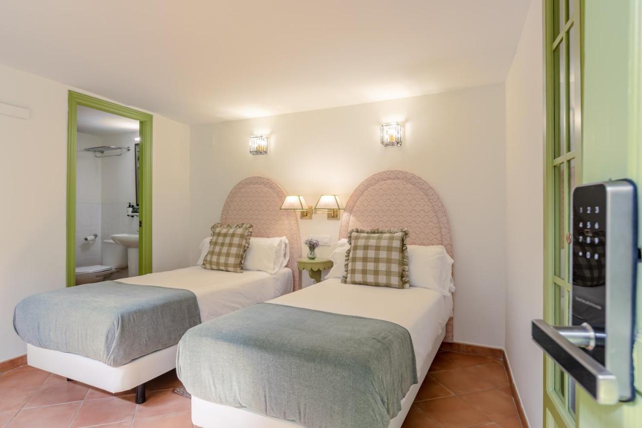 Nuea Giralda Hotel Sevilla Bagian luar foto